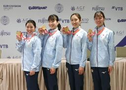 <p>　女子団体で２連覇し、オンライン取材で笑顔の（左から）佐竹玲奈、高木裕美、森ひかる、太村成見＝１９日、バクー（共同）</p>