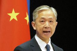 　６月、記者会見する中国外務省の汪文斌副報道局長＝北京（共同）