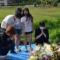 朝陽小に通う児童とその家族