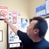 「中華料理　彩菜」は店内に「飲酒運転禁止」と書かれた紙を張り、啓発に取り組んでいる＝市原市