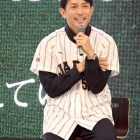 トークショーで笑顔を見せる川崎選手＝７日午後
